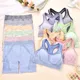 Set Deportivo Mujer Top y Shorts Celeste con Espalda Cruzada y Cintura Elastica 4
